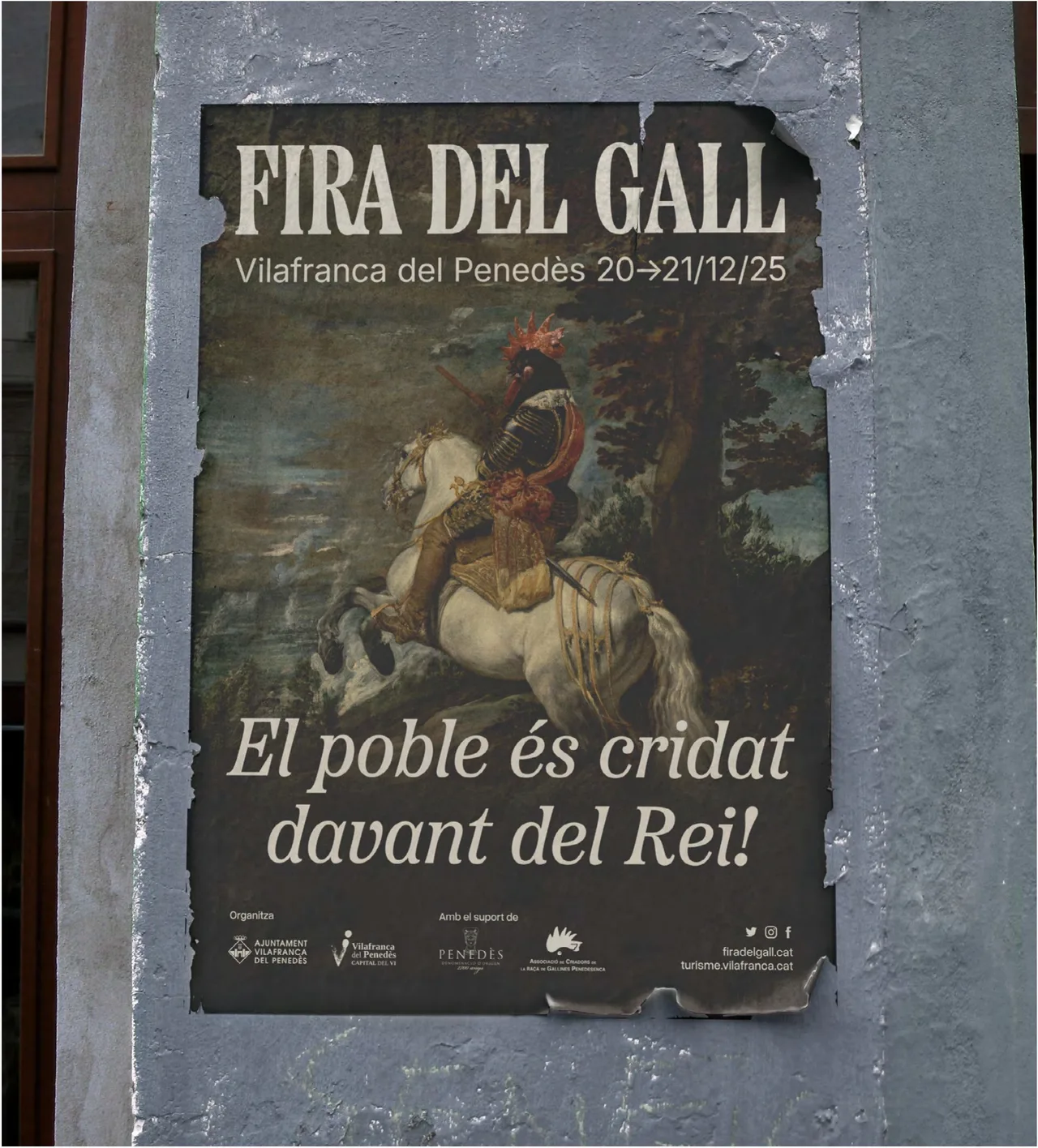 Fira del Gall 2025 poster pasted on a wall, with the rooster on horseback in a baroque painting