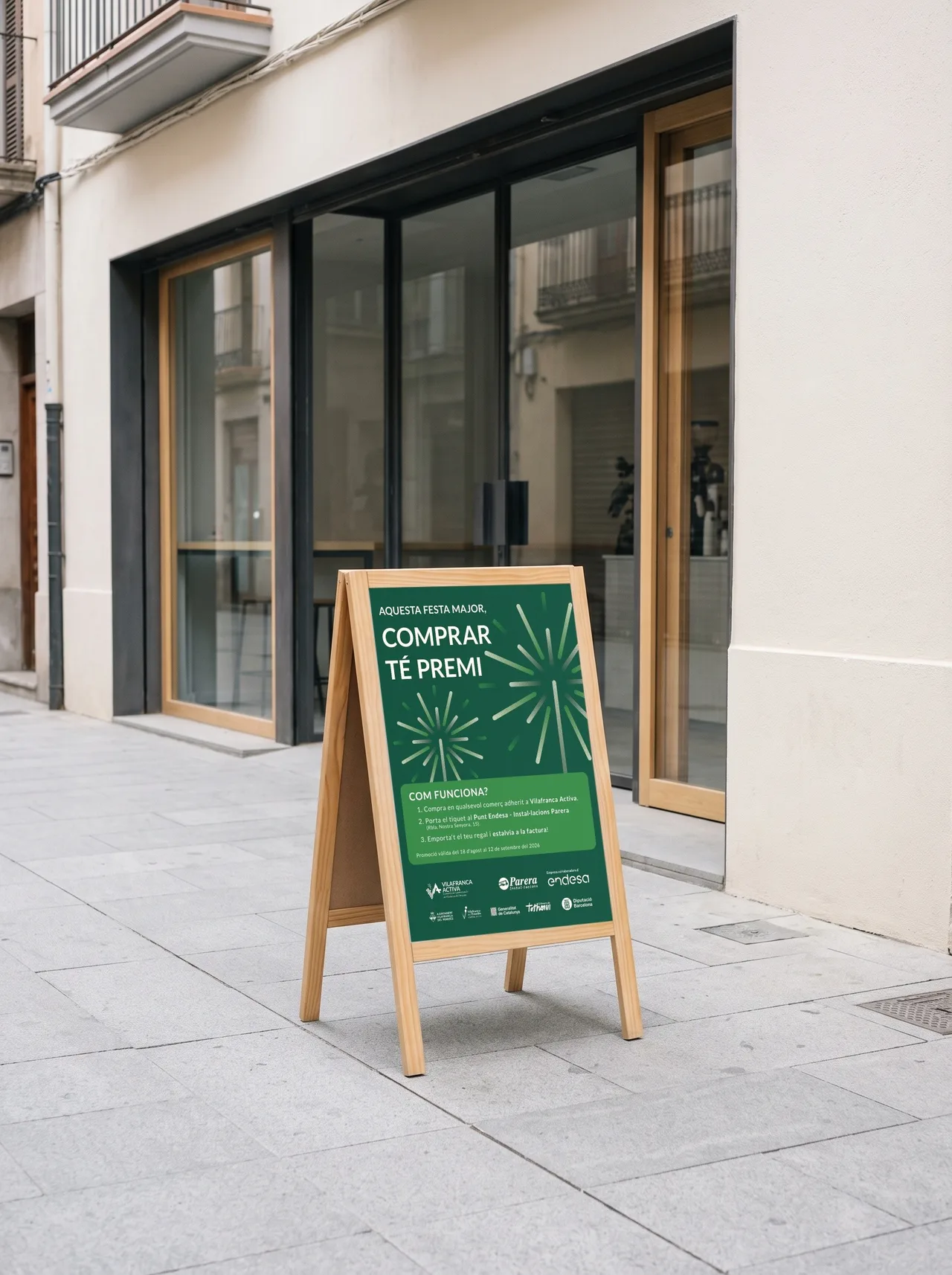 FM Endesa poster on a wooden A-frame outside a shop