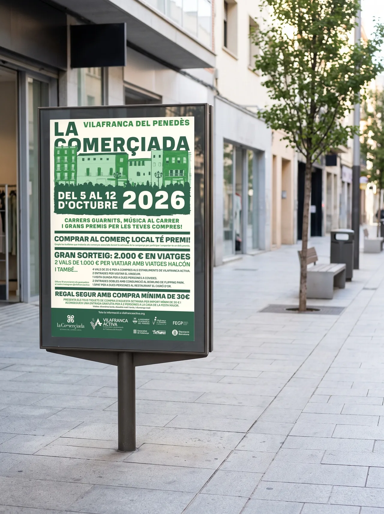 La Comerciada poster in a street display stand